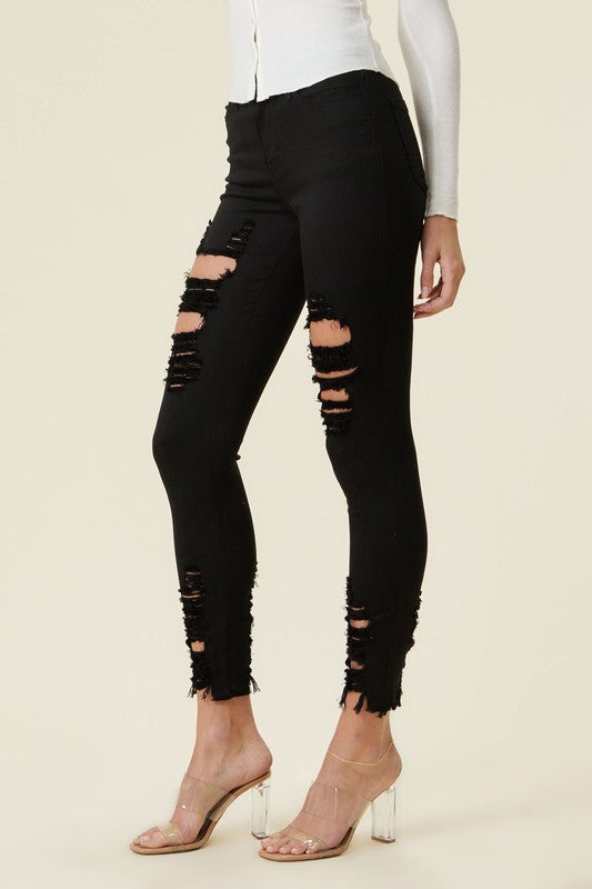 Vibrant M.I.U High Rise Distressed Skinny Jeans with a Raw Hem